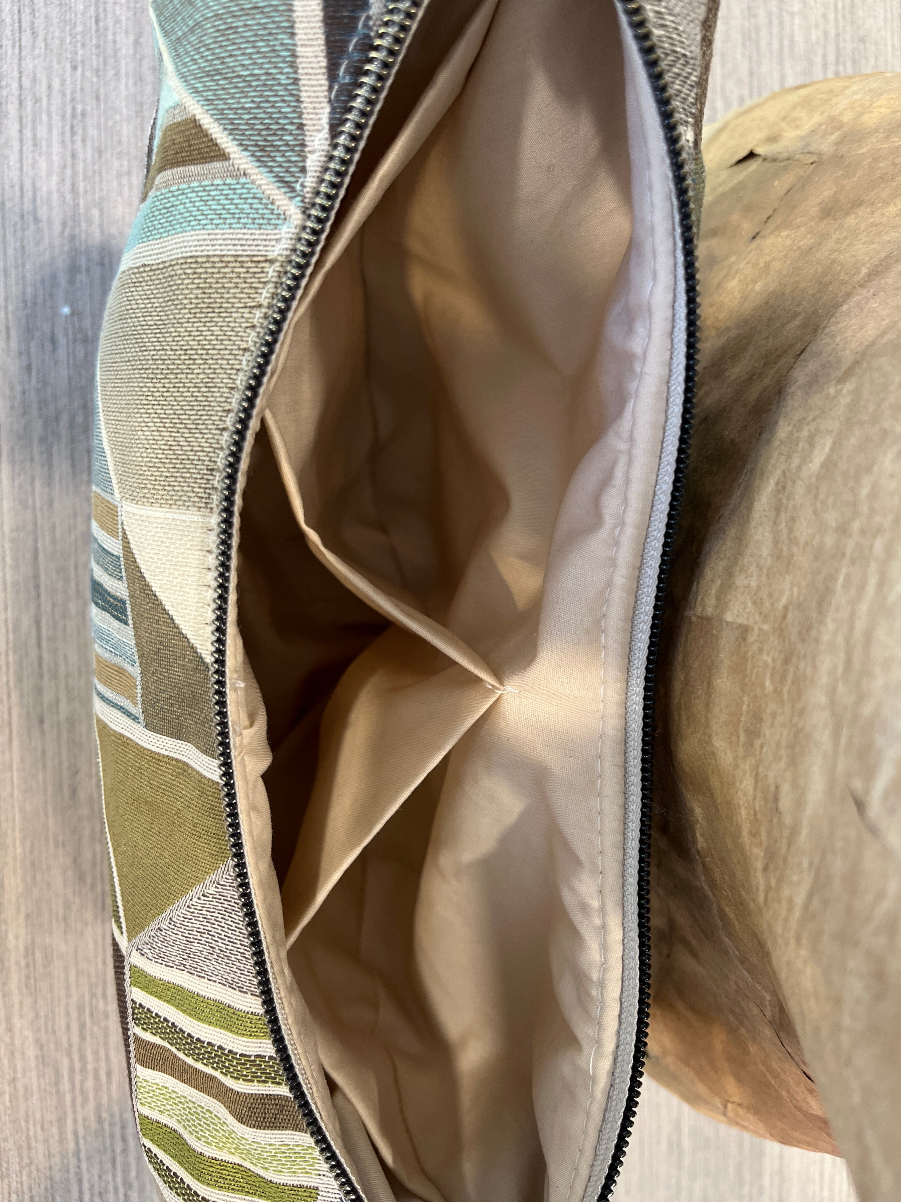 Sac demi-lune à géométrie variable
