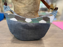 Sac demi-lune à géométrie variable