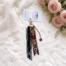 Charme de sac papillon rouge
